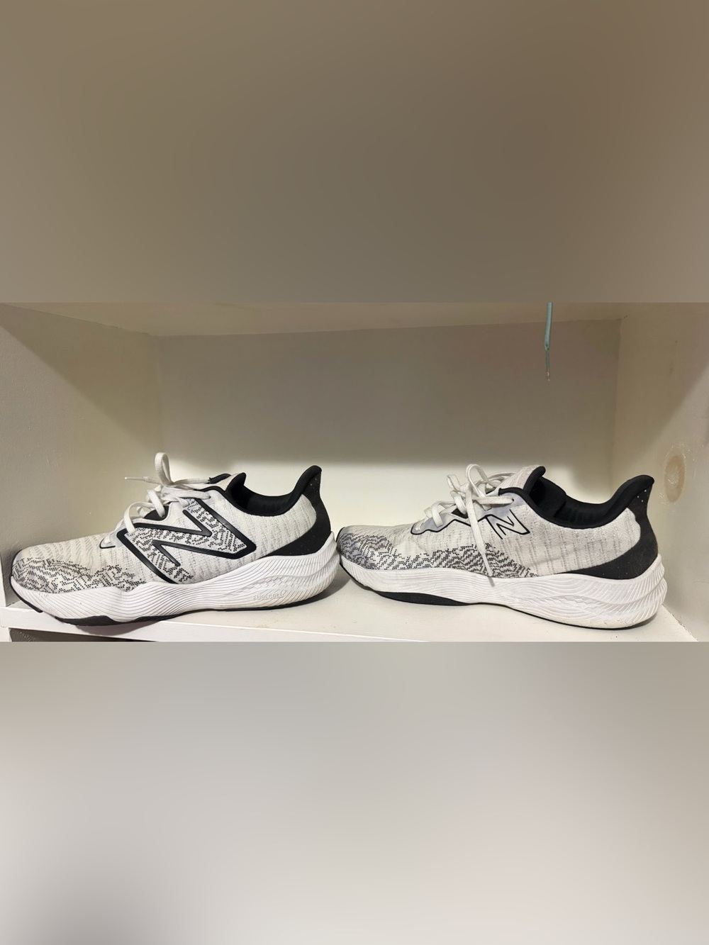 New Balance White and Black Athletic Sneakers